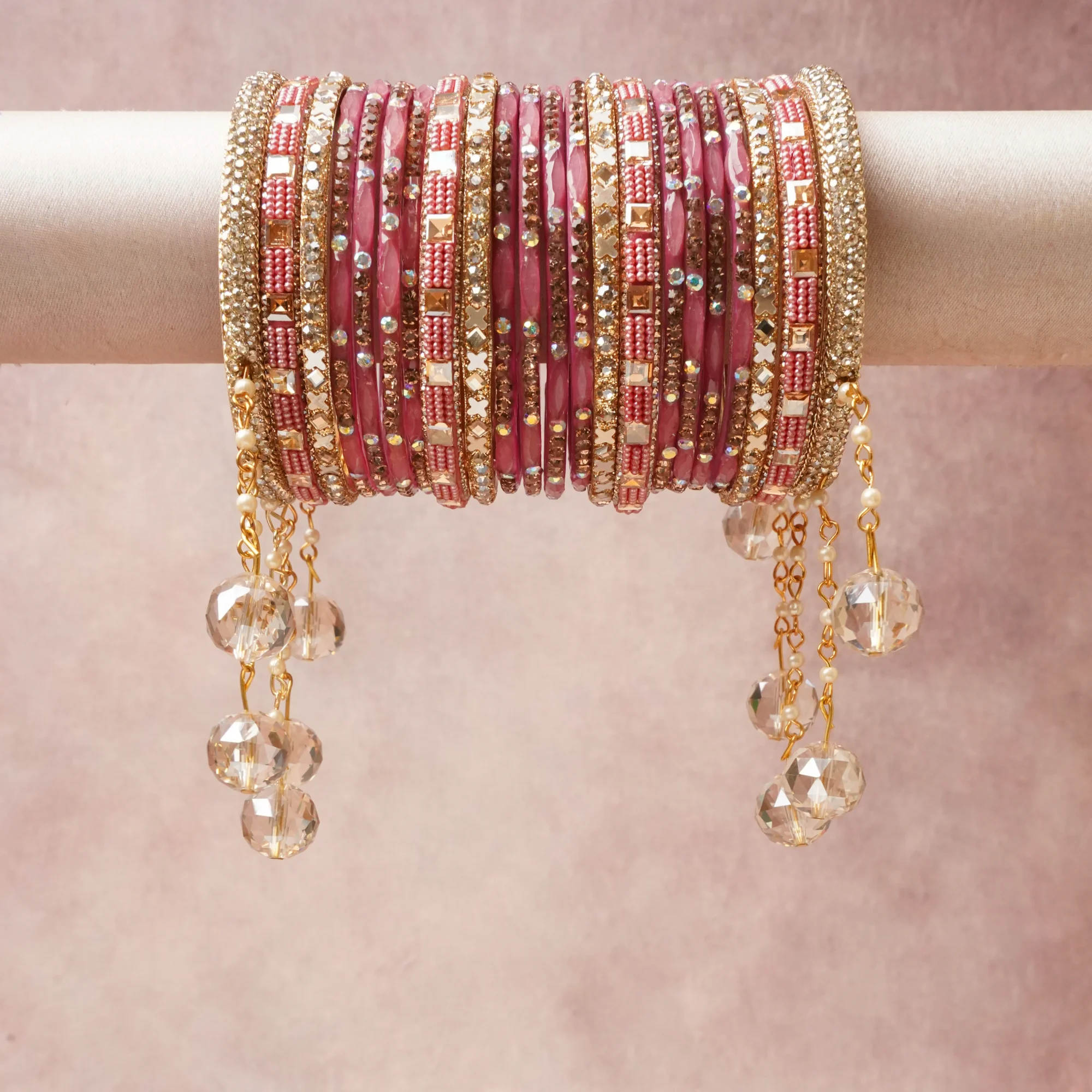 A commanding Rose Pink anchors this beautiful set, enriched with accents of Gold, Clear Crystal, Pearl White, Mirror Silver that add depth and dimension.

Featuring a striking composition of Glass, Crystal, Faux Pearl, Gold-Plated Base Metal, this set carries intricate craftsmanship and strong presence. Grand in form, it is created for moments that deserve to be marked.